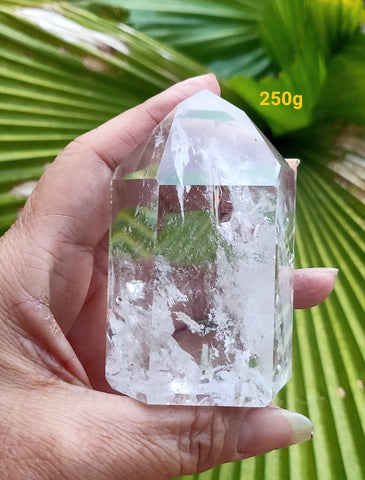 Quartz Point- 250gm 80x50mm * small rainbows inclusions