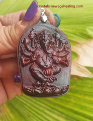 Raja Kayu engraved Lord Ganesha Thousand Hands Pendant